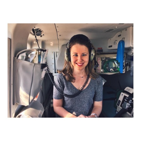 Brooke Buford is wearing Aviation Headsets and going to make a news report on Helicopter. 